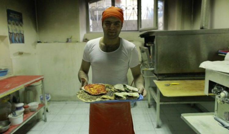 السوريون يبهرون سكان أرمينيا بأروع وصفات الطعام الشرقي